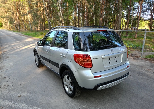 Suzuki SX4 cena 26990 przebieg: 170000, rok produkcji 2009 z Stepnica małe 379